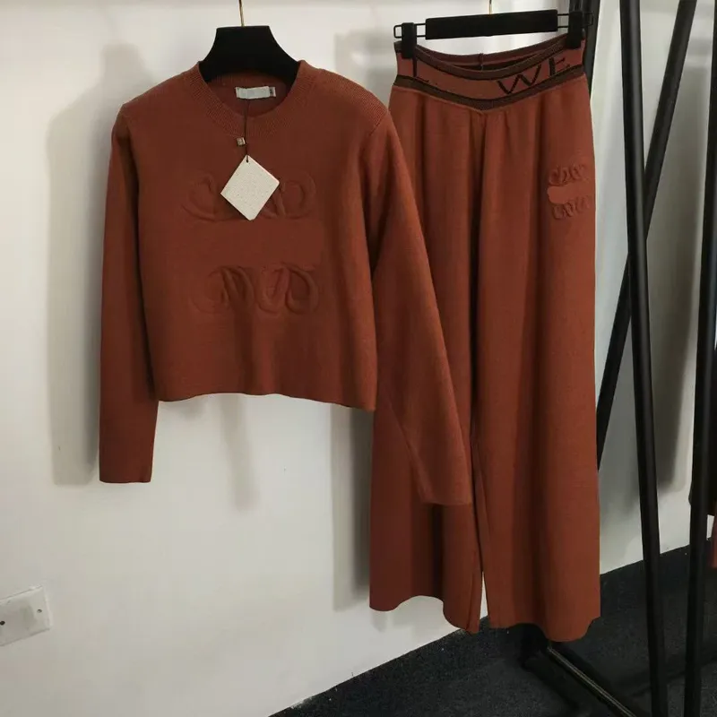 Autumn New European Station Fashion Patrón en relieve Rechero redondo Pantalones de pierna ancha