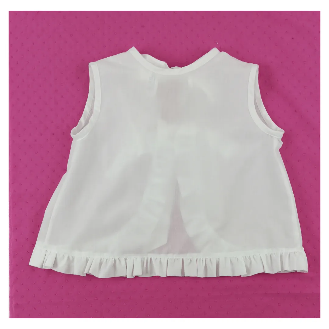 Blusa con lazos en la espalda