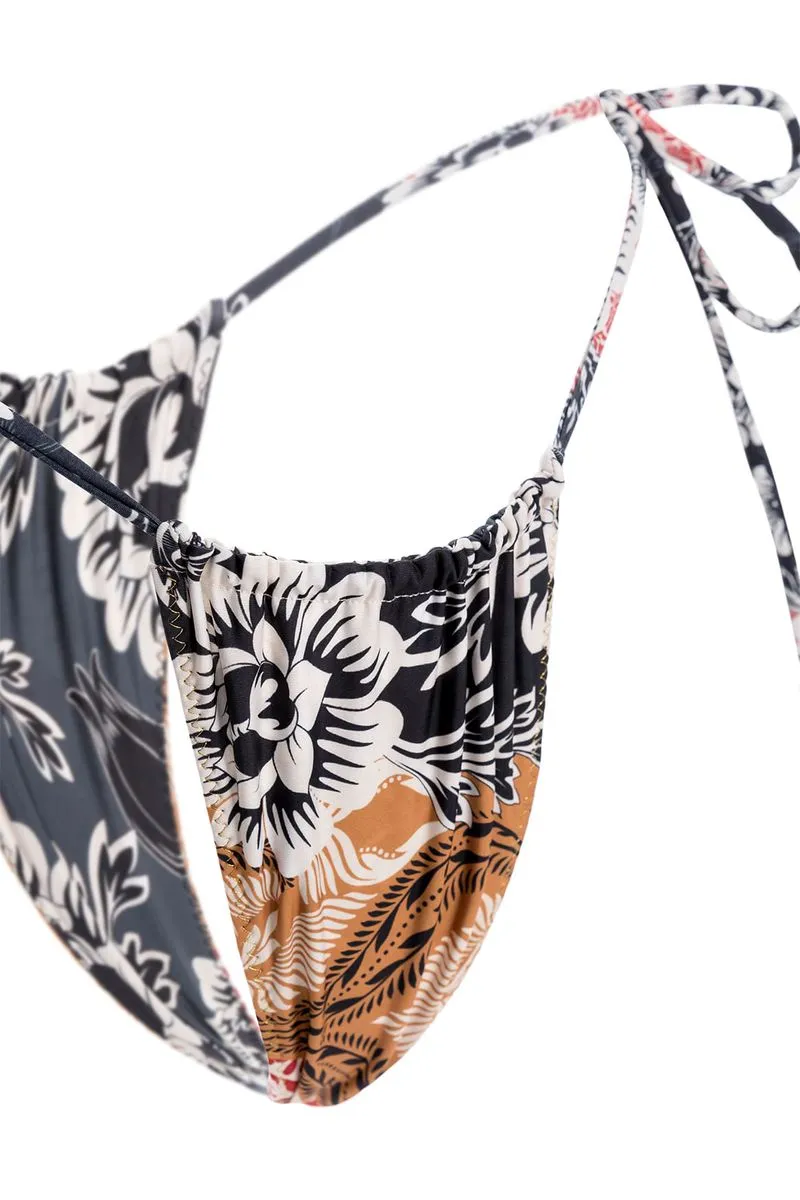 Bottom de bikini reversible y bordado al