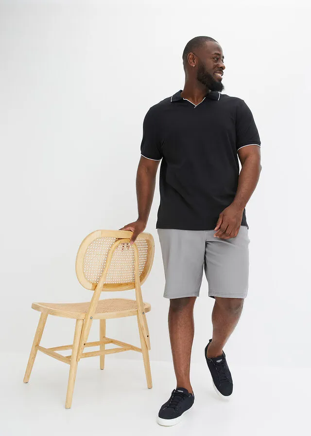 CAMISETA DE TIPO POLO BLANCONEGRO