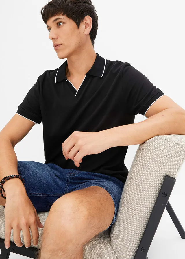 CAMISETA DE TIPO POLO NEGROBLANCO