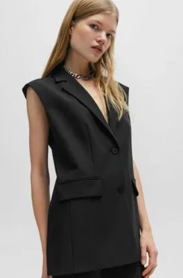 Chaleco largo regular fit con forro de logos