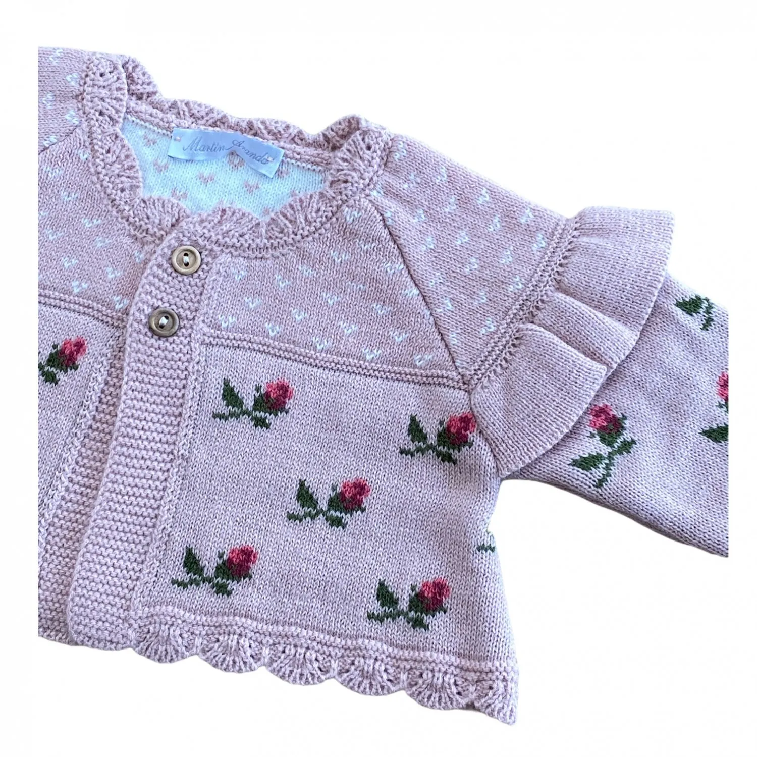 Chaqueta gordita con flores. En rosa o azul.