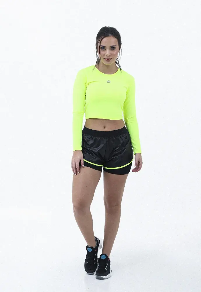 Crop top deportivo manga larga con abertura cruzada en espalda