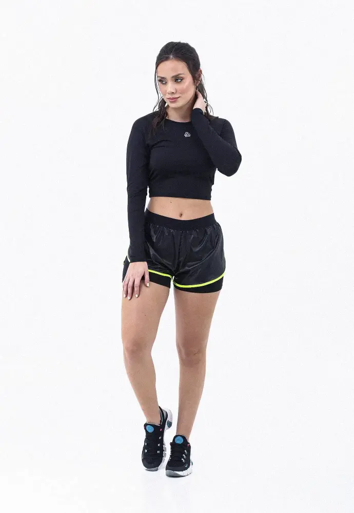 Crop top deportivo manga larga con abertura cruzada en espalda