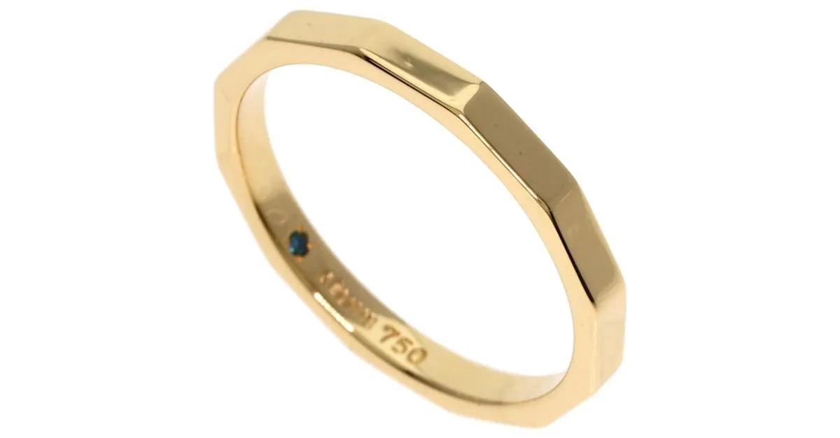Céline Anillo de banda de oro amarillo de 18K con piedra interior Celine 