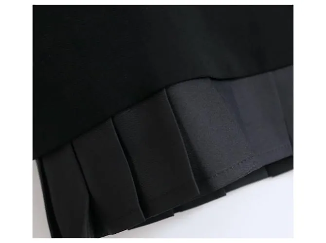 Falda mini con botones de Medusa de Versace Negro 