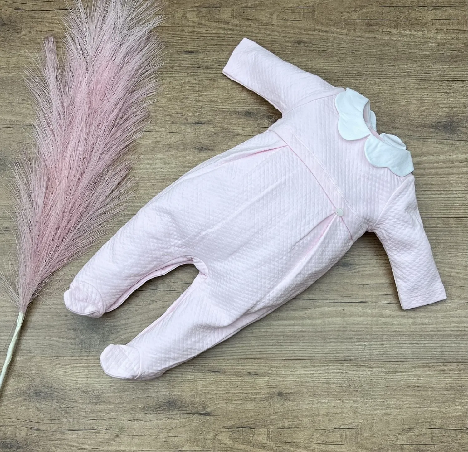 London romper in pink with white..