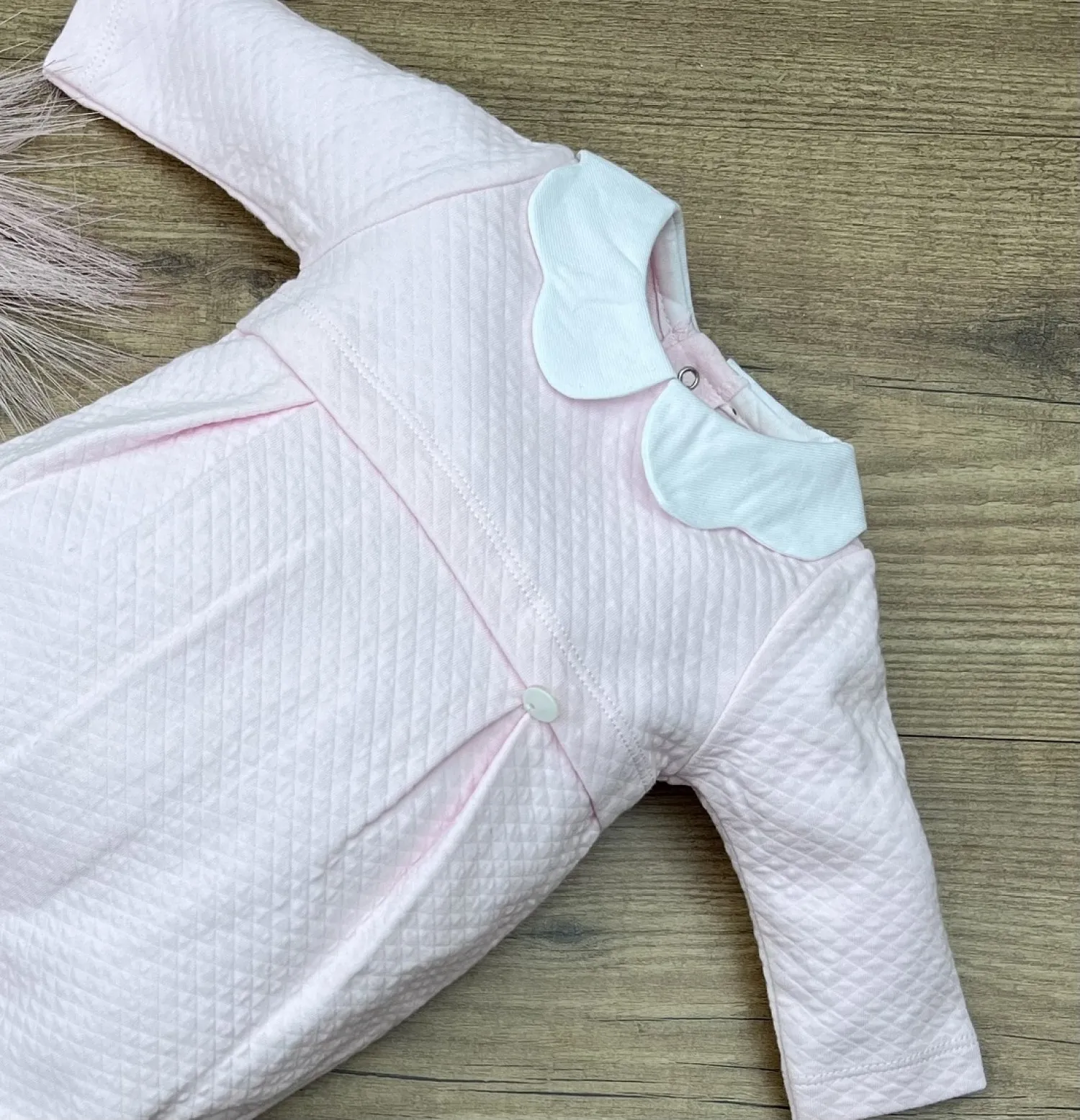 London romper in pink with white..