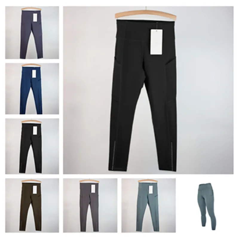 Los pantalones de yoga deportivos femeninos alinean leggings de bolsillo múltiples cepillados de doble cara para la conducción f