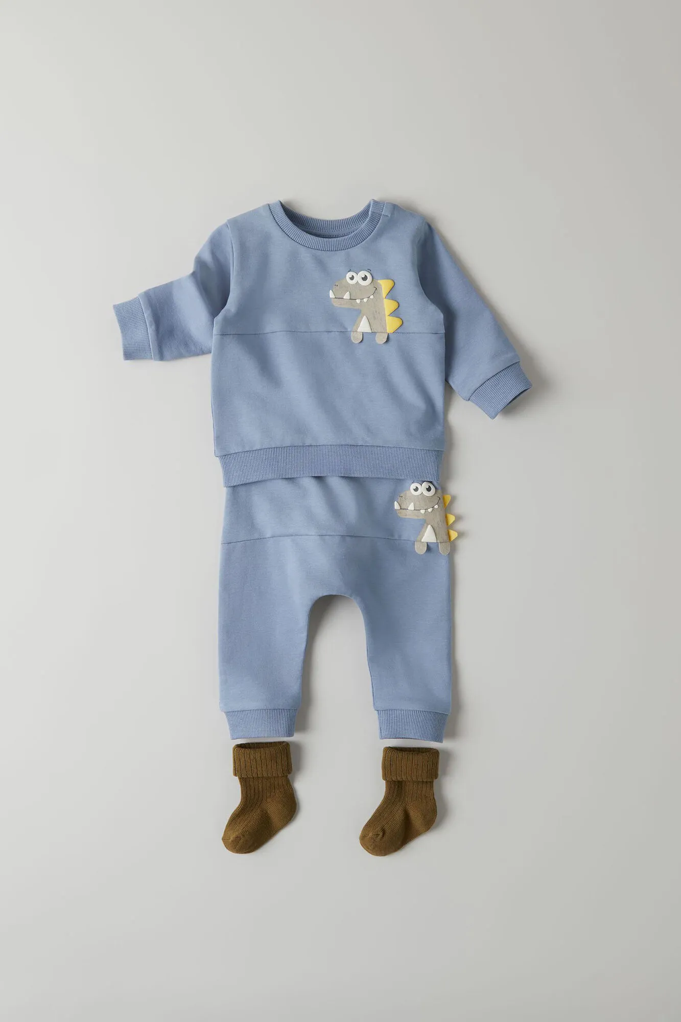 Pantalón bebé niño con divertido dinosaurio