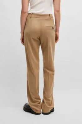 Pantalones regular fit de pernera ancha en franela jaspeada