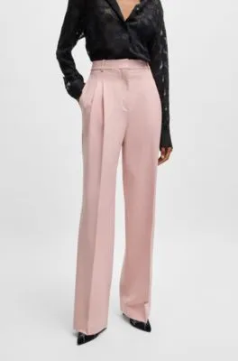 Pantalones relaxed fit con pernera ancha y pinzas dobles