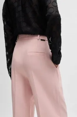 Pantalones relaxed fit con pernera ancha y pinzas dobles