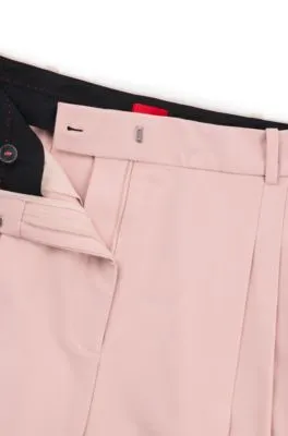 Pantalones relaxed fit con pernera ancha y pinzas dobles