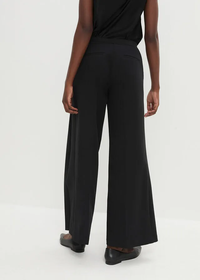 Pantalón ancho con pliegues Negro