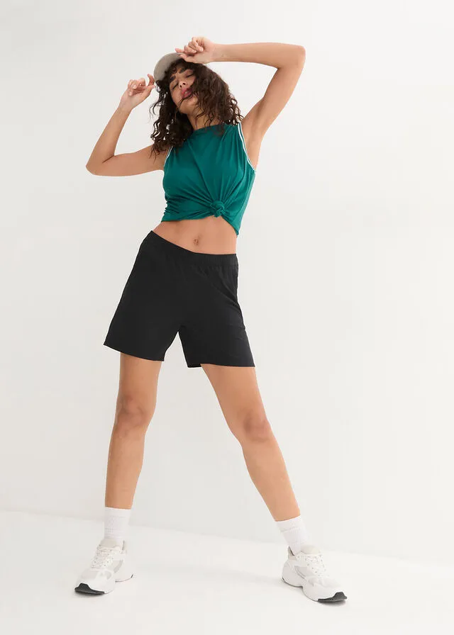 Pantalón deportivo de secado rápido con bolsillos con cremallera, hasta el tobillo Negro