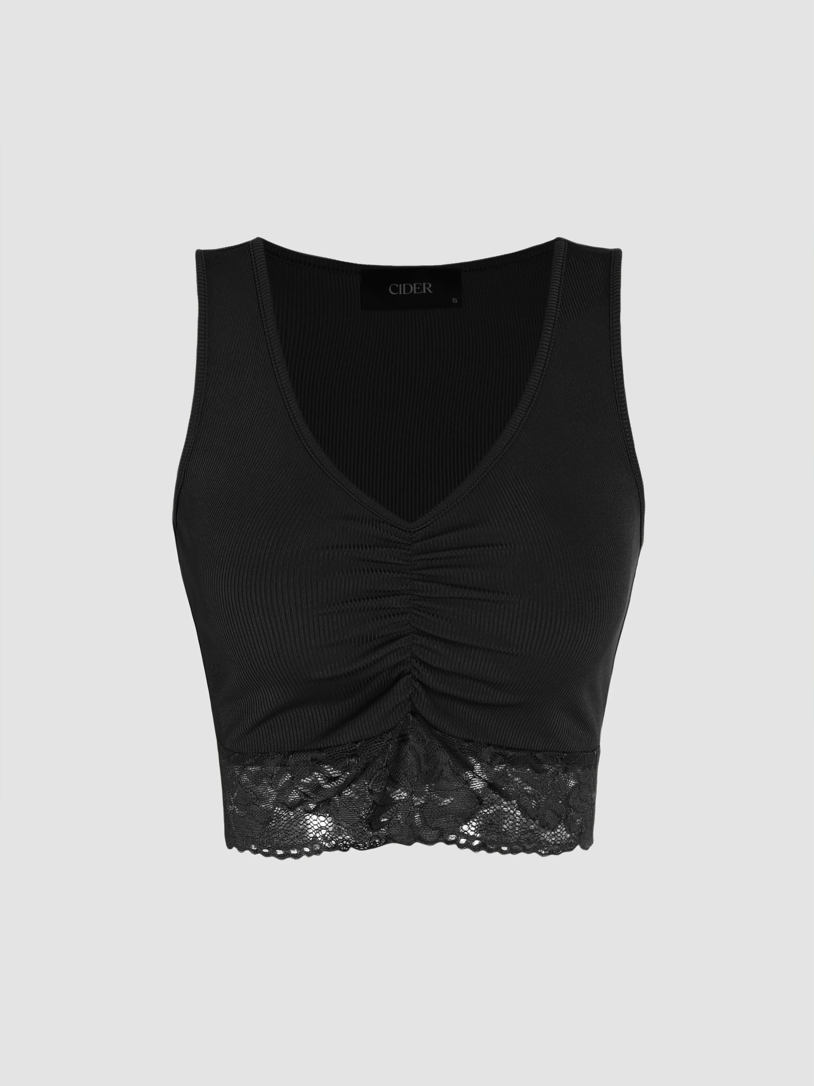 Top de tirantes con cuello en V y encaje en el dobladillo sólido