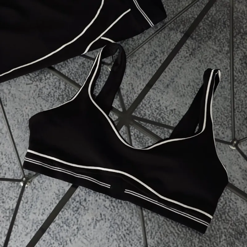 Un diseñador de yoga set de sujetador sin costuras Sports Heart Stron Bra+Leggings High End White Striped Back Back Dance Yoga Y