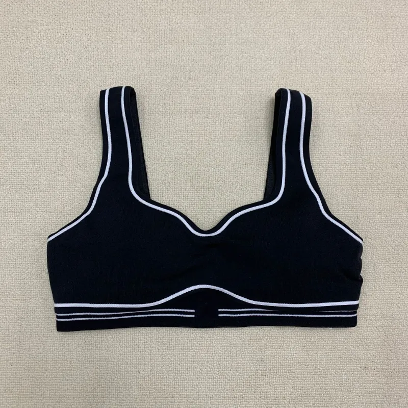 Un diseñador de yoga set de sujetador sin costuras Sports Heart Stron Bra+Leggings High End White Striped Back Back Dance Yoga Y